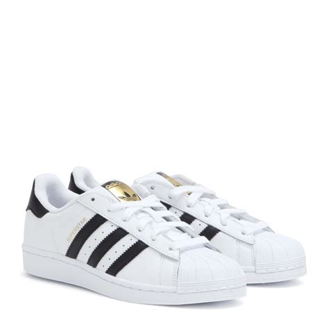 witte adidas sneakers baby|Adidas white leather shoes.